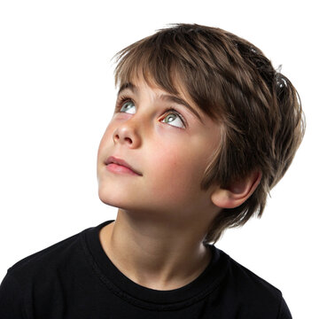 Young boy looking up with wonder isolated on transparent background