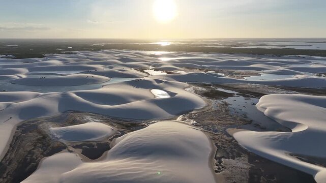 Sunset Lencois Maranhenses In Santo Amaro Maranhao Brazil. Natural Freshwater Lagoon Nestled Between White Sand Dunes. Sunrise Clouds Beach Sea. Sunrise Outdoor Beach Travel. Santo Amaro Maranhao.