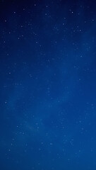 A captivating view of a dark blue night sky filled with countless stars twinkling in the vast expanse above