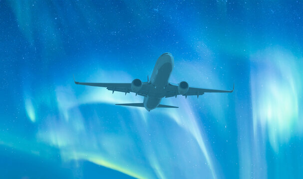 Northern Lights or Aurora Borealis with commercial passenger airplane