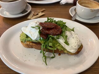 sun dried tomato, poached eggs, smashed avacado and rocket on sourdough toast