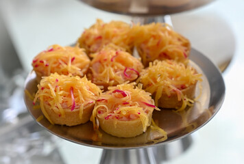 kingdom cheese mini quiches, savory cheese tarts on platter, elegant brazilian event appetizers, mini quiches
