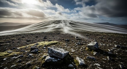 Powerful wind sweeps across a desolate rocky moorland under dramatic cloudy skies
