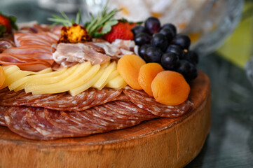 catering buffet food, banquet table with snacks,  savory breadsticks with rosemary garnish, elegant appetizer crackers in glass bowl, catering display of gourmet snacks