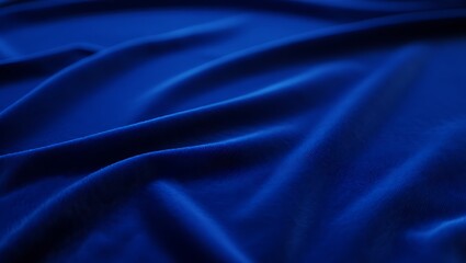 Obraz premium Luxurious Deep Royal Blue Velvet Fabric Draped in Soft Folds with Elegant Texture