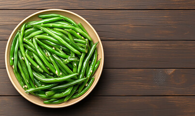 A rustic and natural composition of fresh green beans on a brown wooden table. This photo is great for content related to cooking, country living, farmers' markets