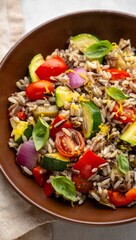 Healthy wild rice salad with fresh vegetables and herbs