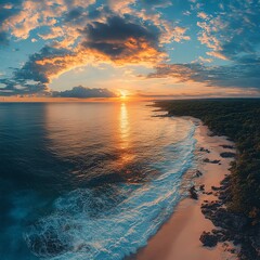 Vibrant sunset over calm ocean waves and shoreline.