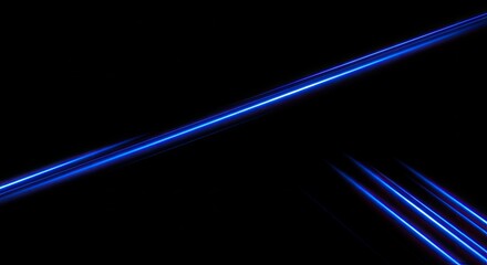 Fototapeta premium Striking abstract image featuring vivid blue light trails against a dark background