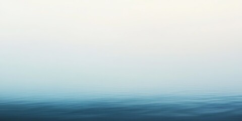 a subtle gradient transitioning from light grey to soft blue, creating a calm and understated abstract background