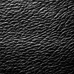 Detailed close up of a black leather texture with rough grainy surface and subtle lighting effects