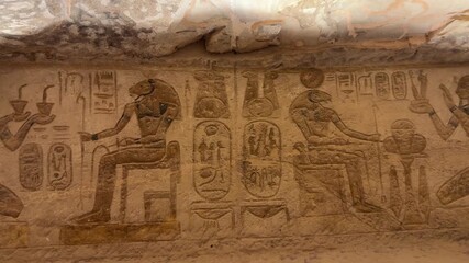 Exploring ancient egyptian art, detailed views of hieroglyphs and figures in tomb - Powered by Adobe