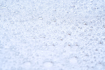 The texture of dense foam with bubbles.