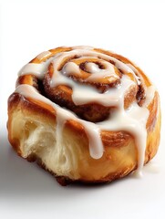 Freshly baked delicious cinnamon roll drizzed with cream cheese icing on clean white background, perfect food photo for food blog, food magazine, baking advertising and promotion