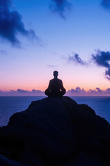 A mystical silhouette of a meditating person sitting on a rock by the ocean. Deep blue and purple hues create a peaceful and spiritual atmosphere, ideal for mindfulness and relaxation themes.
