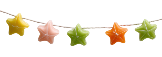 Colorful star-shaped decorations strung together, showcasing vibrant hues of yellow, pink, green, and orange.