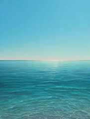 Fototapeta premium Calm ocean waters under a clear pale blue sky