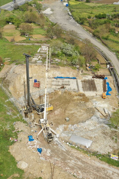 Aerial view of construction site with heavy machinery and raw materials, blending with the natural landscape, &Auml;&deg;stanbul, &Auml;&deg;stanbul, T&Atilde;&frac14;rkiye.