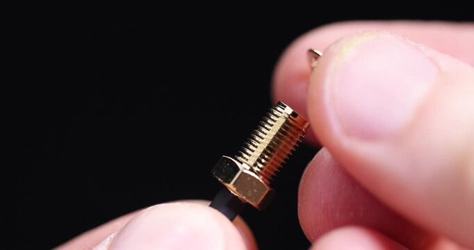 metal wire attachment for connecting different devices, hold in your hand a piece of acoustic wire with a metal tip for connecting different equipment