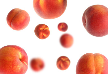 Fresh peaches whirling in air against white background