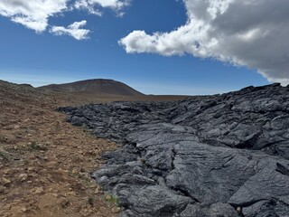 Solidified lava spreads across the desert.