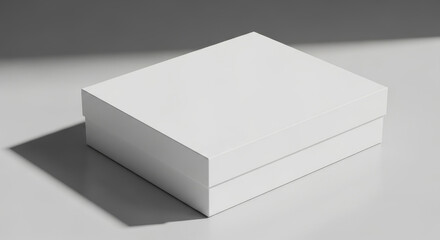 Fototapeta premium Blank White Product Box Mockup - Clean, simple of a blank white rectangular box, perfect for packaging design presentations. Ideal for showcasing product designs