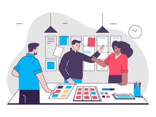 Creative team in design studio discussing branding strategy