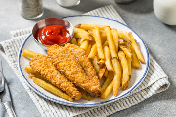Deep Fried Tender Chicken Fingers and French Fries