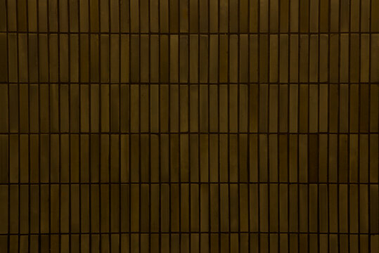 Dark brown wall mosaic texture
