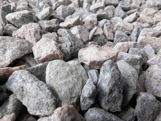 Natural gravel landscape creates a textured backdrop for construction and outdoor design projects in vibrant gray tones