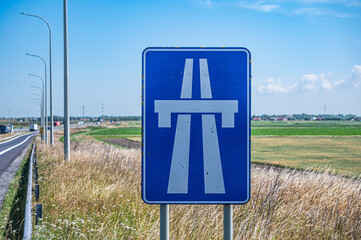 Highway sign at the E 40 shoulder in Avekapelle, Veurne, Belgium
