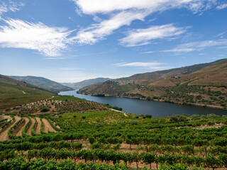 mountain landscape with blue sky and clouds, Douro Valley, Portugal