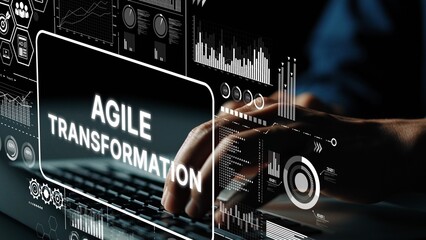 Hands Typing on Laptop with Graphical Data Representations for Agile Transformation Concept in...