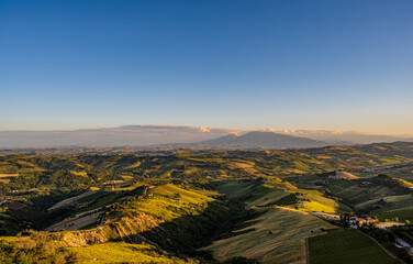 Obraz premium Marche, spectacular view and sunset on the Marche hills from the Ripatransone viewpoint.