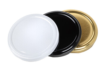 White, black and gold twist-off lids lying on white background