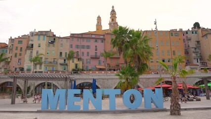 Menton France Blue Sign Tourism French Riviera Beach City Historic Town. Colorful Buildings Summer in European Town Cote d'Azur