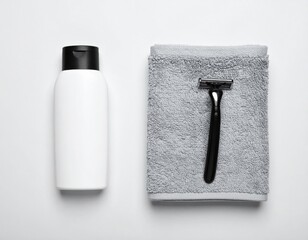 Monochrome Still Life with Razor Towel and Lotion Bottle on a White Background