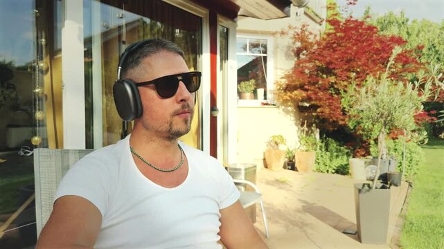 Man relaxing with cup outdoors