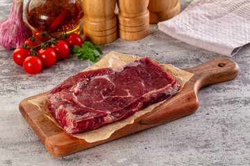 Gourmet raw rib eye steak