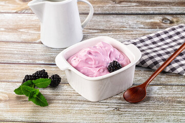 Organic tasty dairy yoghurt with blackberry
