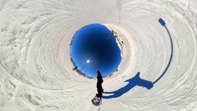 Snowboarding. A snowboarder rides down a mountain slope at a ski resort. Extreme sports and a healthy lifestyle. Pleasure and drive. Winter snow, sun and blue sky 25