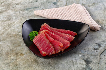 Raw red tuna sashimi slices