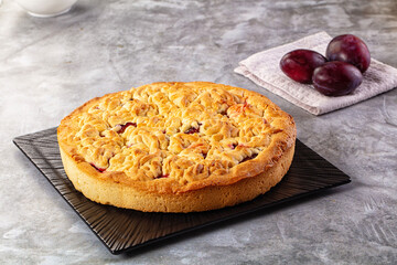 Sweet homemade pie with plums