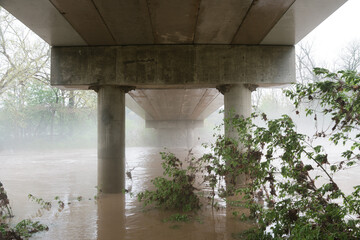 Water Flows Under a Bridge After a Rainstorm