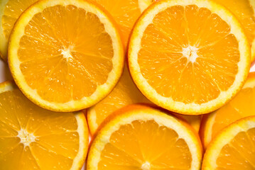 Orange fruit slices isolated on a background. Top view. Flat lay.  Oranges Fruit Background. Oranges Slices. Healthy Food.