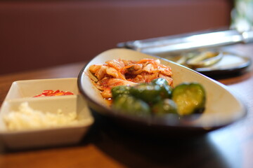 Kimchi pickled cabbage salad spicy savory vegetables fresh delicious gourmet food background on the table rustic food top view copy space vegetarian and vegan food