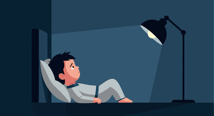 Fototapeta premium Boy Lying Awake Under Lamp During Night Suffering From Insomnia