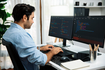 Smart IT developer working software development coding with creating application program update...