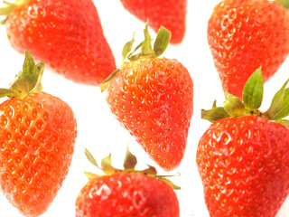 Fresh and juicy red strawberry on white background. Premium high quality organic product. Food supply industry.