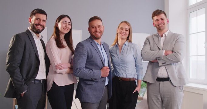 Corporate hr smiling diverse employees portrait, confident executive and workers standing in modern office room, looking at camera, successful startup founder with team, staff members, corporate staff